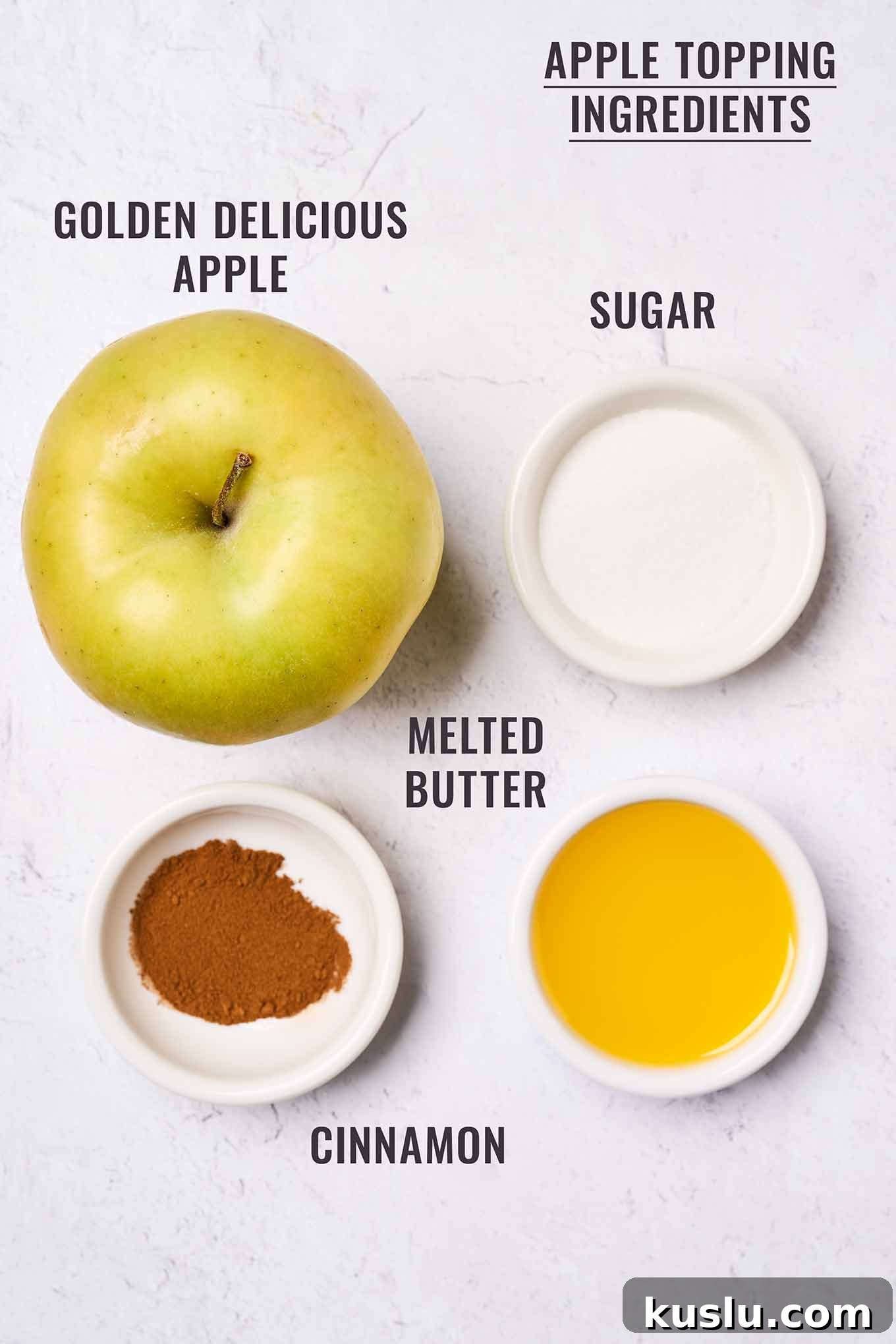 Moist Golden Delicious Apple Cake Recipe for Fall Baking 4 A labeled, overhead view of the topping ingredients for Golden Delicious apple cake; apple, melted butter, sugar, and cinnamon.