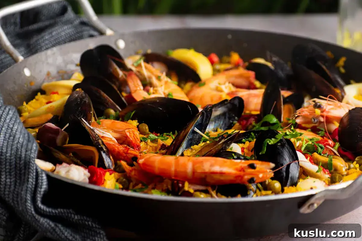 15 Irresistible Seafood Recipes You’ll Make Again and Again 12 Seafood Paella Valenciana