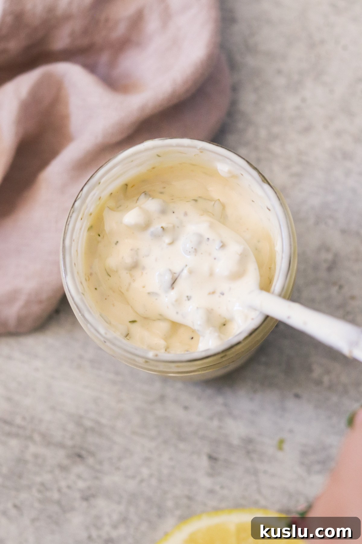 Homemade Tartar Sauce Recipe That Tops Store-Bought Options 6 an overhead view of a homemade tartar sauce recipe in a jar