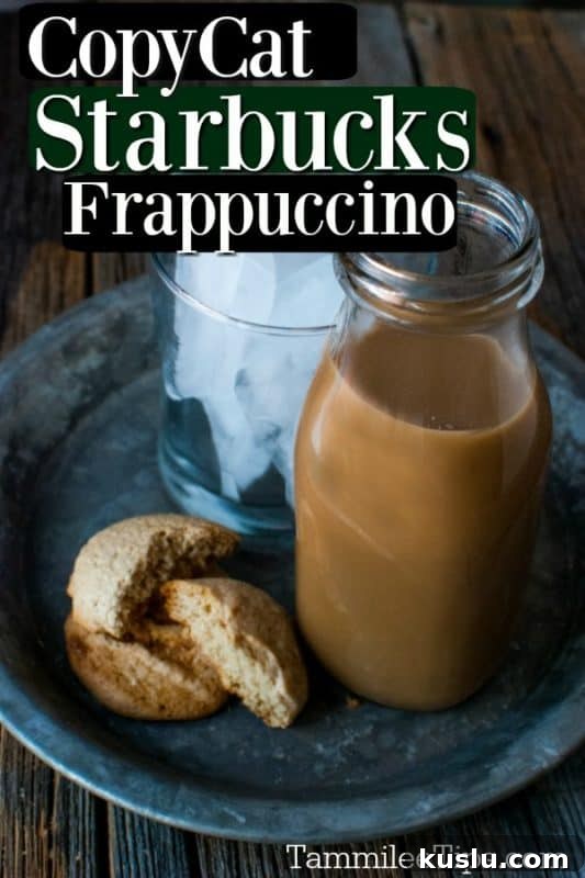 Copycat Starbucks Frappuccino over a glass jar filled with frappuccino and a glass of ice 