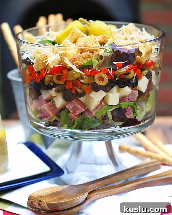 Layered Muffuletta Salad in a trifle dish