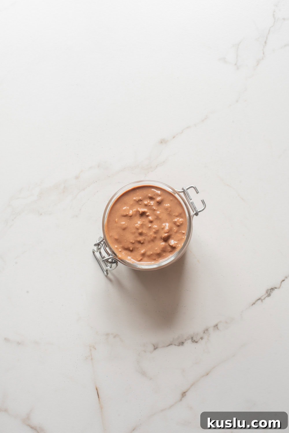 Chocolate hemp power overnight oats in a jar.