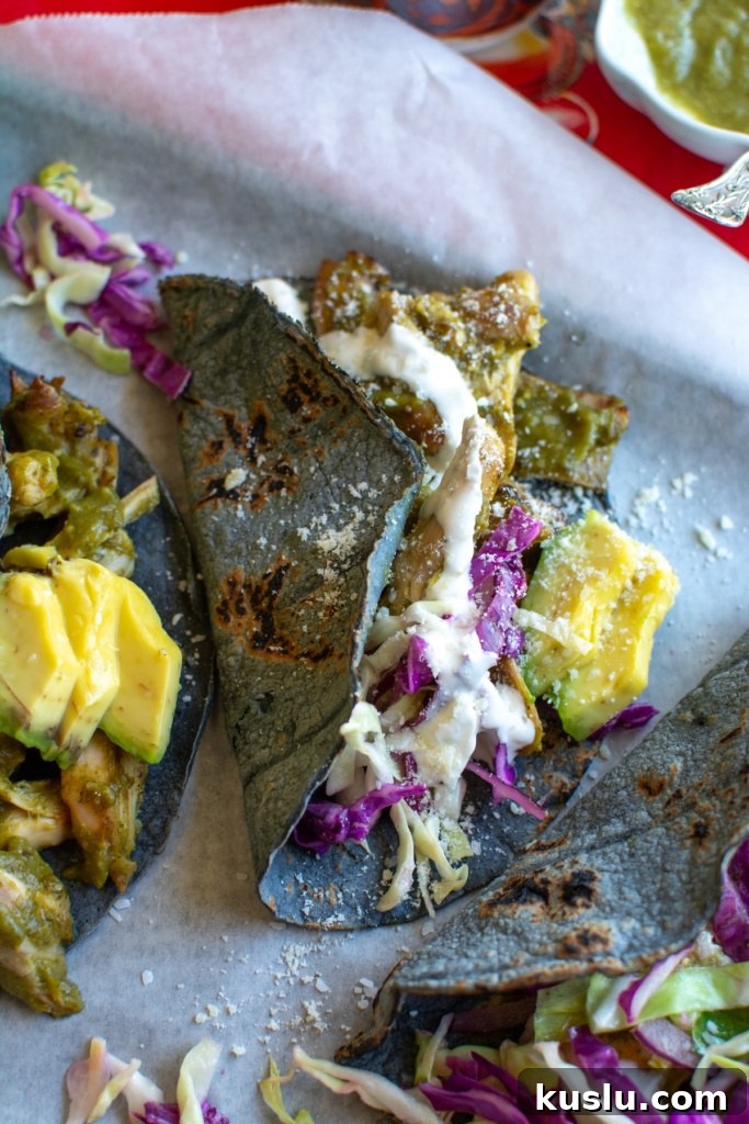 Sheet Pan Chili Verde Chicken Tacos Recipe for Quick Weeknight Meals 6 several chili verde chicken tacos on a sheet pan