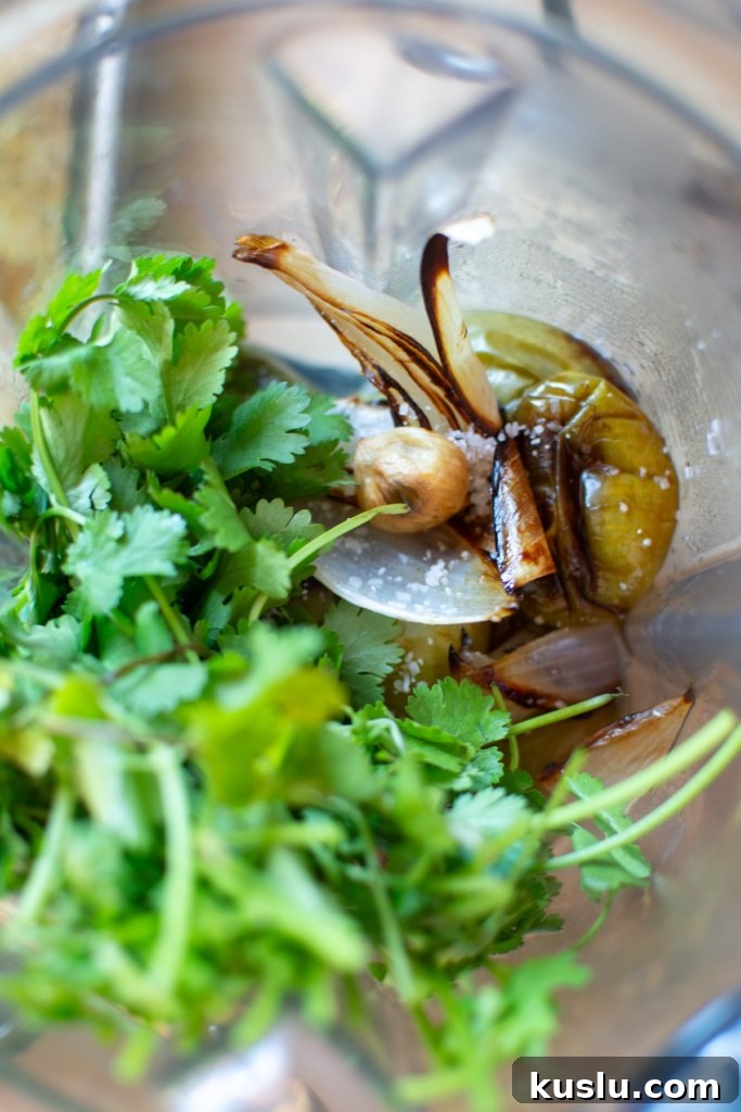 Sheet Pan Chili Verde Chicken Tacos Recipe for Quick Weeknight Meals 3 All the ingredients for the chili verde sauce in the blender