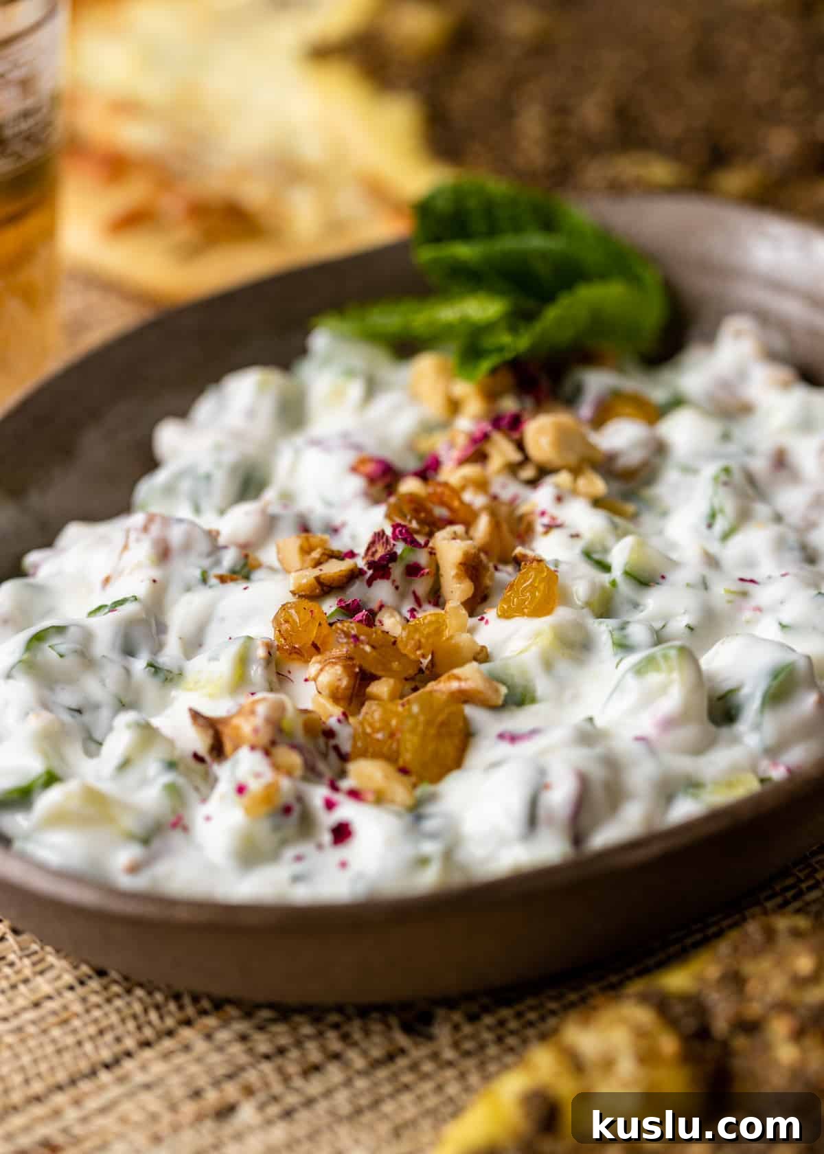 closeup: persian cucumber salad in brown bowl