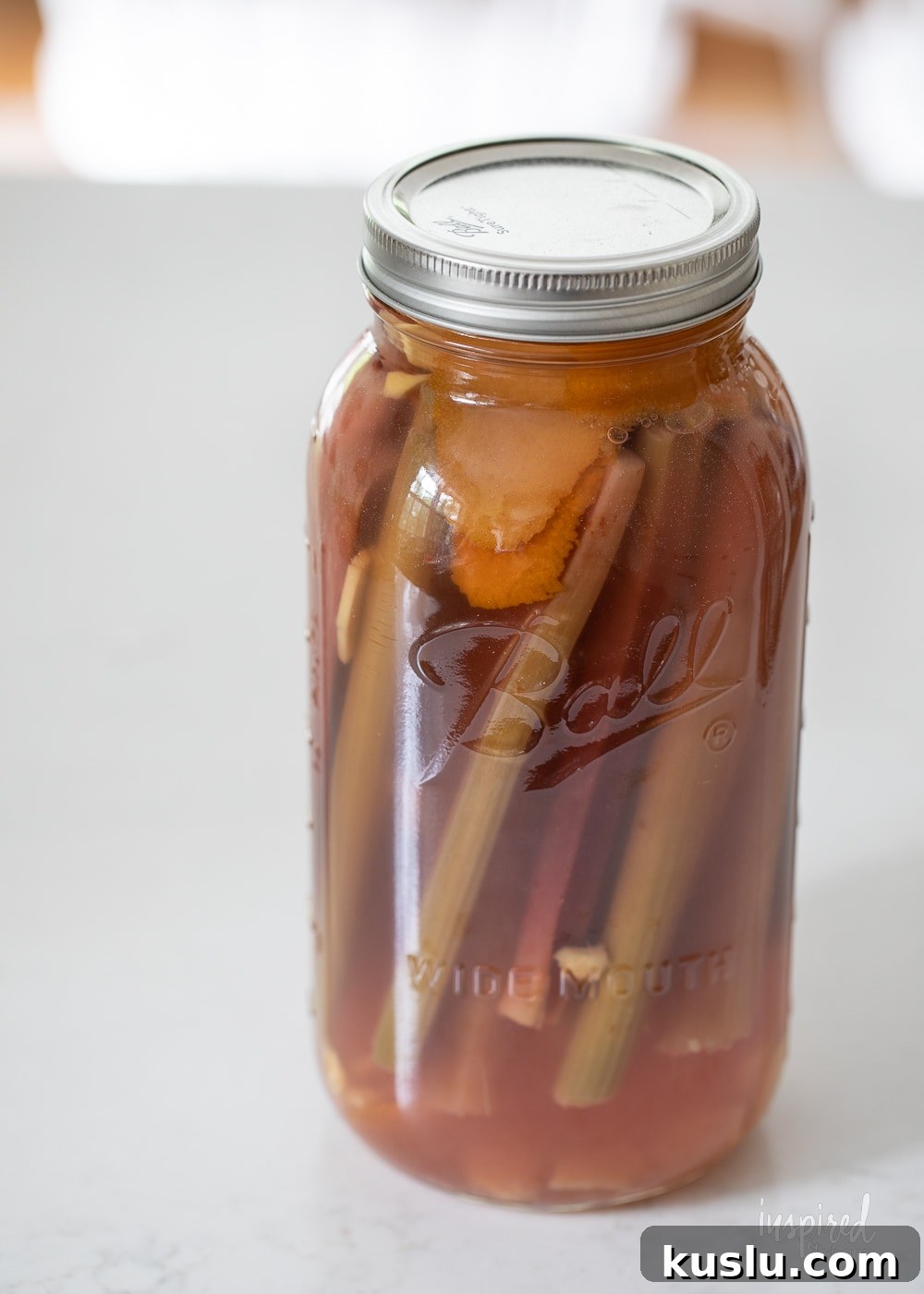 Homemade Rhubarb and Ginger Infused Vodka Recipe 7 homemade rhubarb ginger vodka in a mason jar.