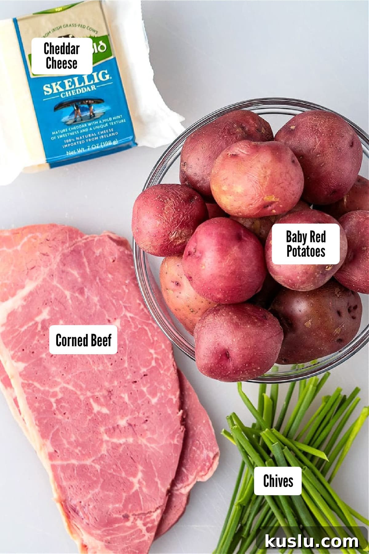 ingredients for making stuffed potatoes with corned beef and cheese