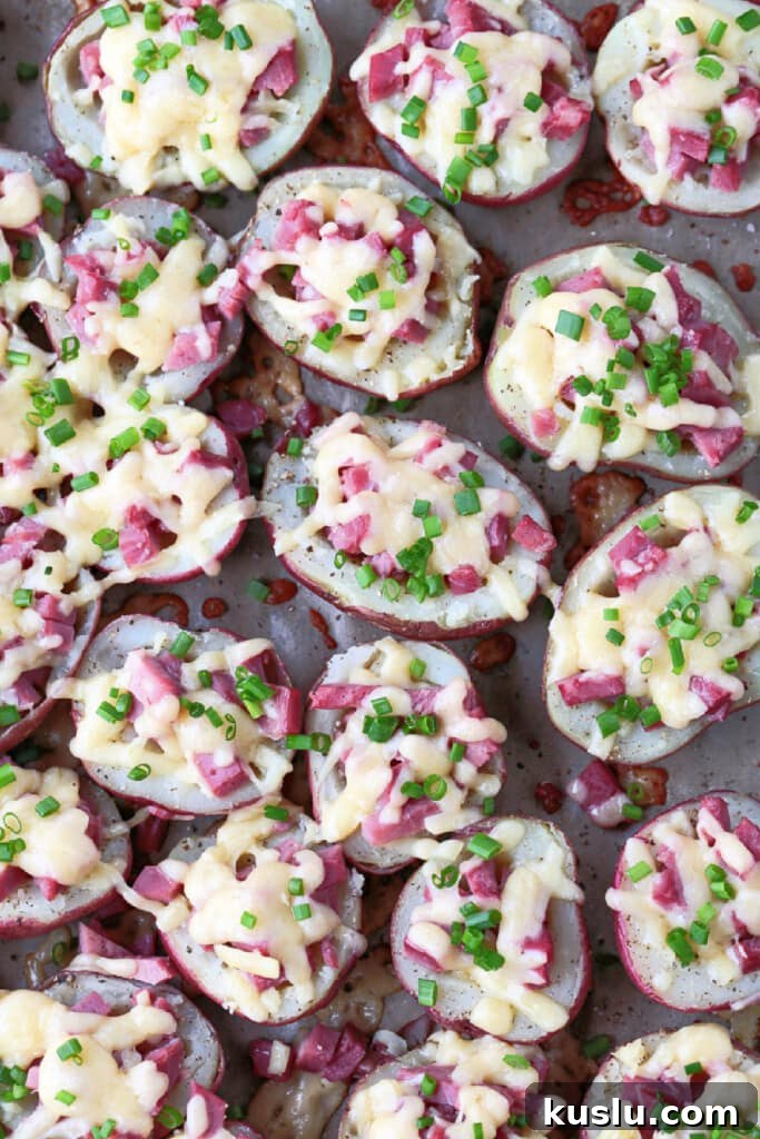 potato halves stuffed with cheese and corned beef