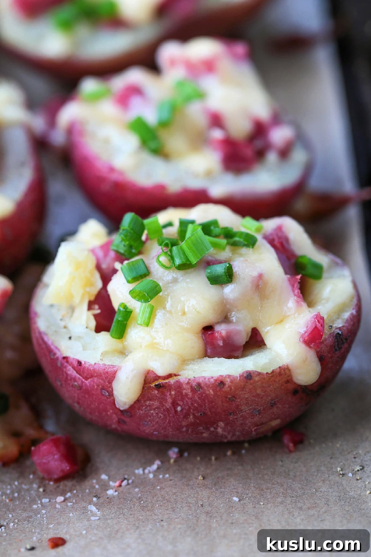 mini red potato stuffed with corned beef and cheddar cheese