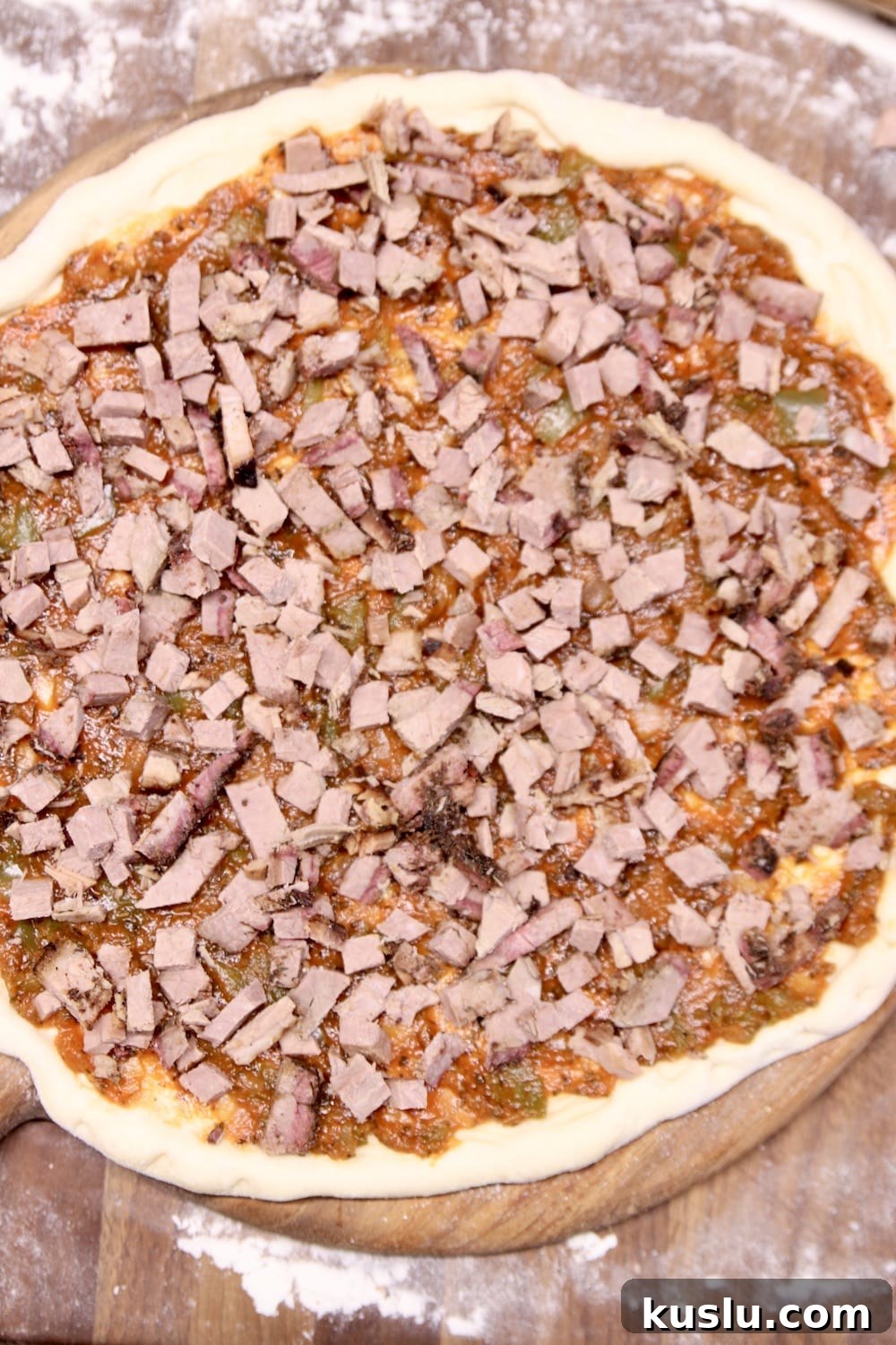 Smoky Brisket Pizza Recipe: How to Make Tender Brisket Pizza at Home 2 making chopped brisket pizza