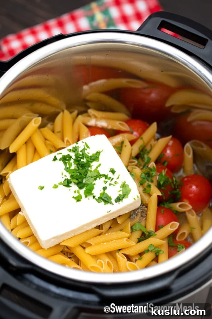 Instant Pot feta pasta ingredients in the pot.