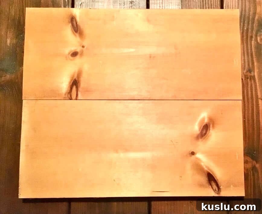 Two wood boards attached together.