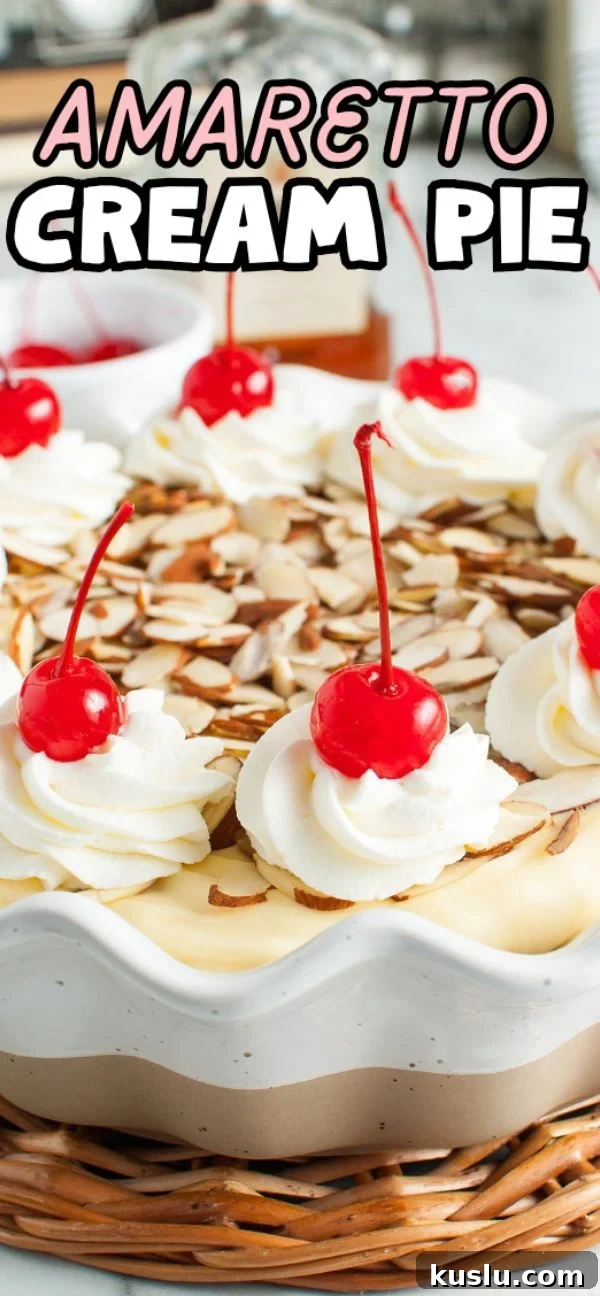 Decadent Amaretto Cream Pie Recipe with Almond Liqueur Filling 19 A luscious Amaretto Cream Pie topped with whipped cream, cherries, and almond slices in a decorative pie dish, featuring a delicate almond crust.