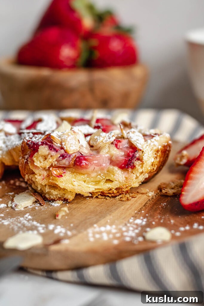 Strawberry Almond Bostock Made from Croissant Pastry 9 Cross section of the bostock showing the insides.