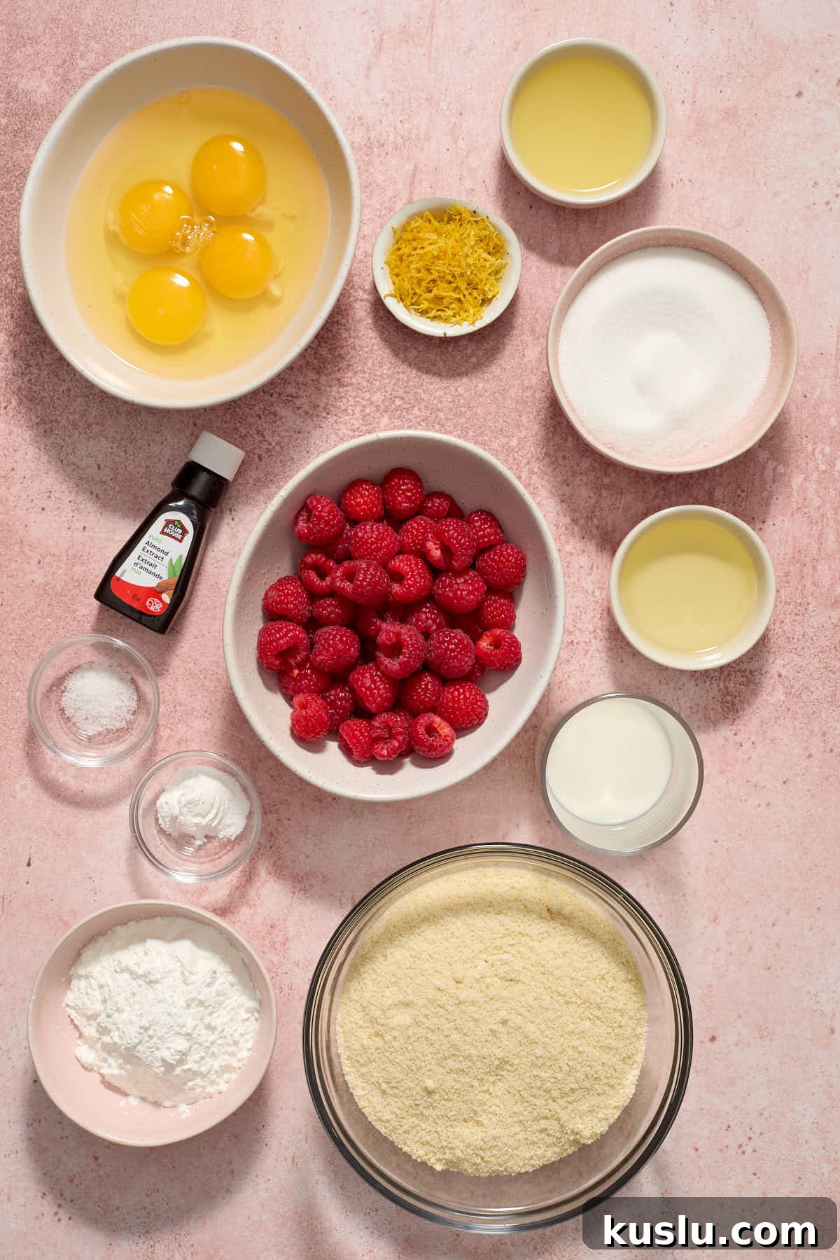 Raspberry lemon cake batter ingredients arranged individually.