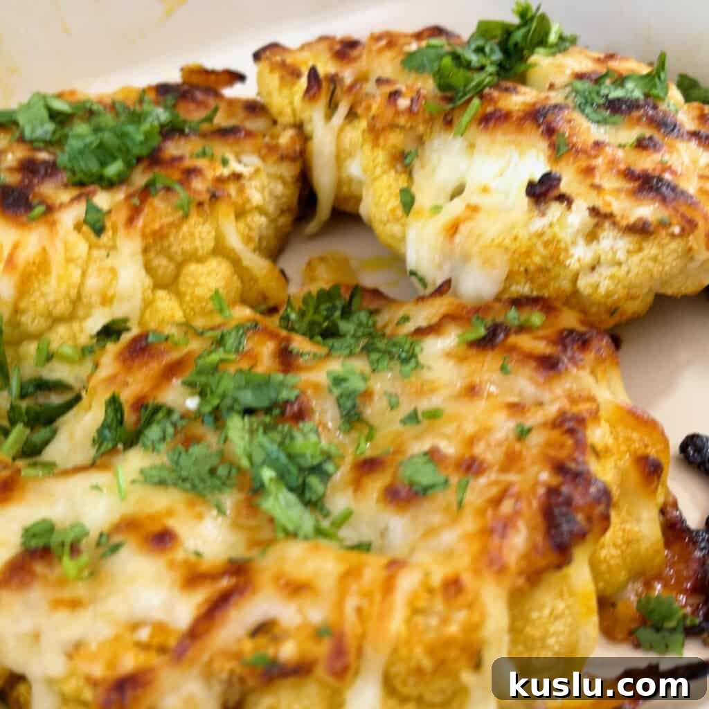 closeup of cheesy cauliflower steaks