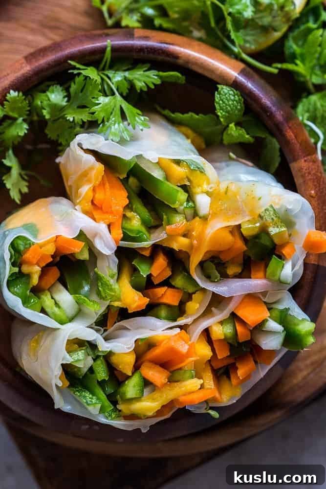Mango Bell Pepper Rice Paper Rolls + Mango Cilantro Dipping Sauce These mango bell pepper rice paper rolls are the perfect summer food! They are stuffed with lots of amazing veggies and come with an insanely delicious mango cilantro dipping sauce! These are naturally gluten free, vegan and low carb!