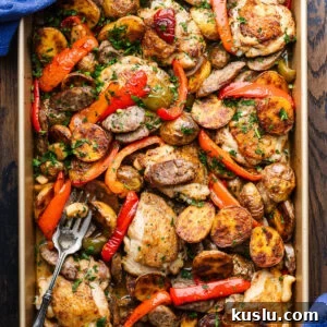 Savory Chicken Scarpariello Recipe: Zesty Italian Classic 8 Chicken Scarpariello in gold baking pan with serving fork.