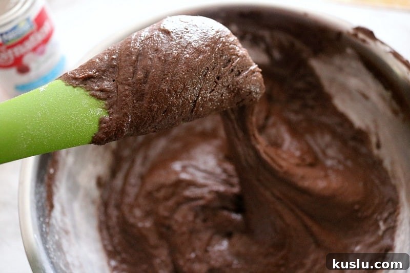 spatula scooping batter. 