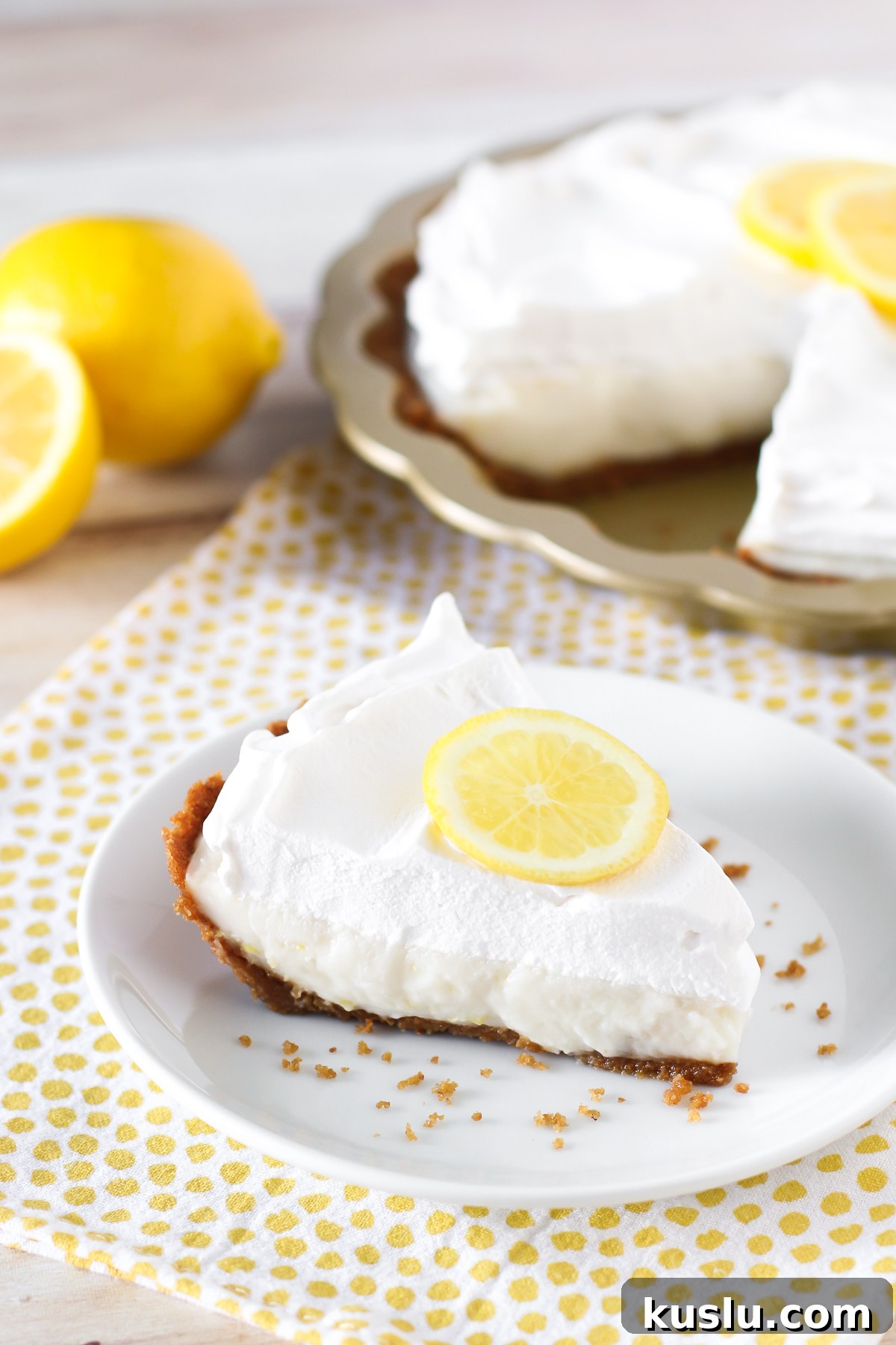 Gluten Free Vegan Lemon Cream Pie. Creamy, dreamy lemon filling in a graham cracker crust. A luscious lemon pie!