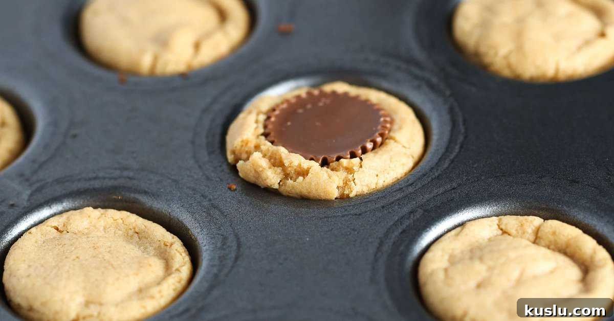 Reese’s Peanut Butter Cup Cookies Recipe: Gooey Chocolate Peanut Butter Treats 4 Ingredients and dough