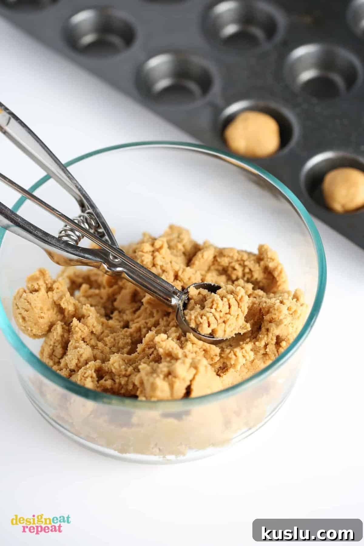Reese’s Peanut Butter Cup Cookies Recipe: Gooey Chocolate Peanut Butter Treats 5 Cookie dough in bowl with scoop