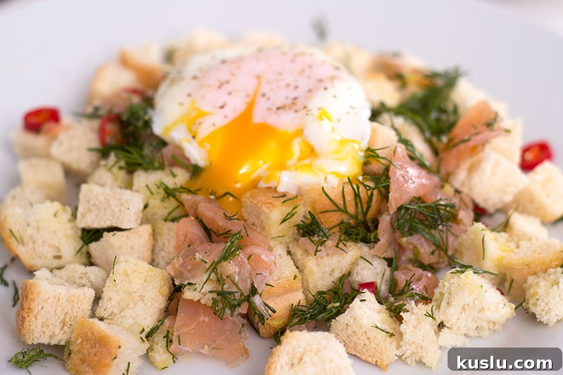 Brunch smoked salmon panzanella with poached egg