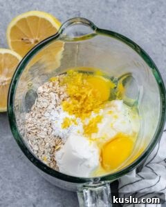 Lemon Blueberry Ricotta Pancakes Recipe for Fluffy, Tangy Stacks 13 Adding oats, eggs and ricotta to a blender.