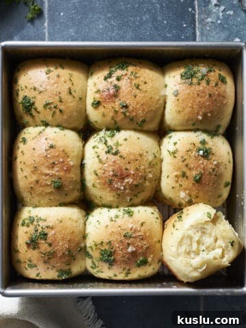 Sourdough Discard Garlic Rolls in a square pan.
