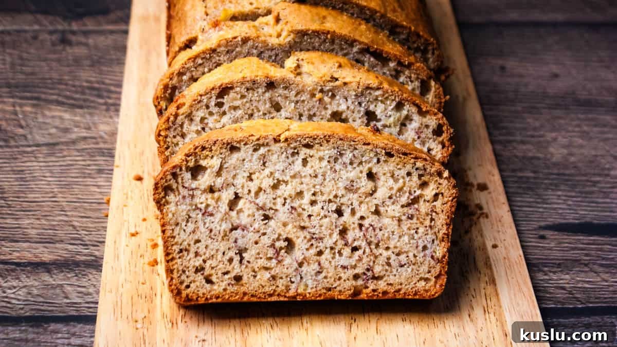 Sourdough Discard Recipes You’ll Want to Make Again and Again 4 Sourdough Banana Bread: moist banana bread made with sourdough discard showing perfect texture when sliced.