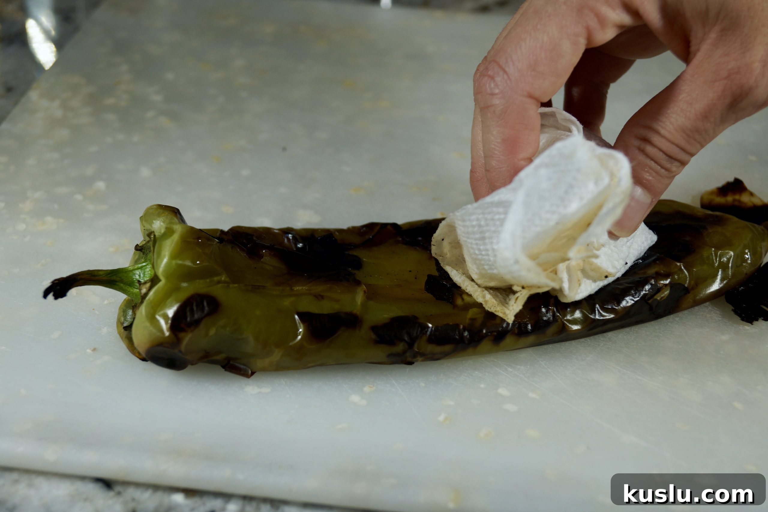 How to Roast Green Chiles at Home: Simple, Crispy Methods 9 Peeling roasted green chiles #roastegreenchilesathome