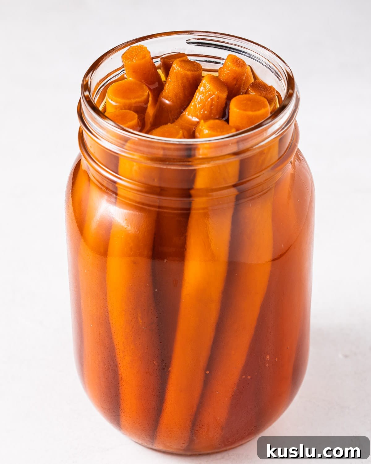 Yamagobo in pickling juice in a jar.