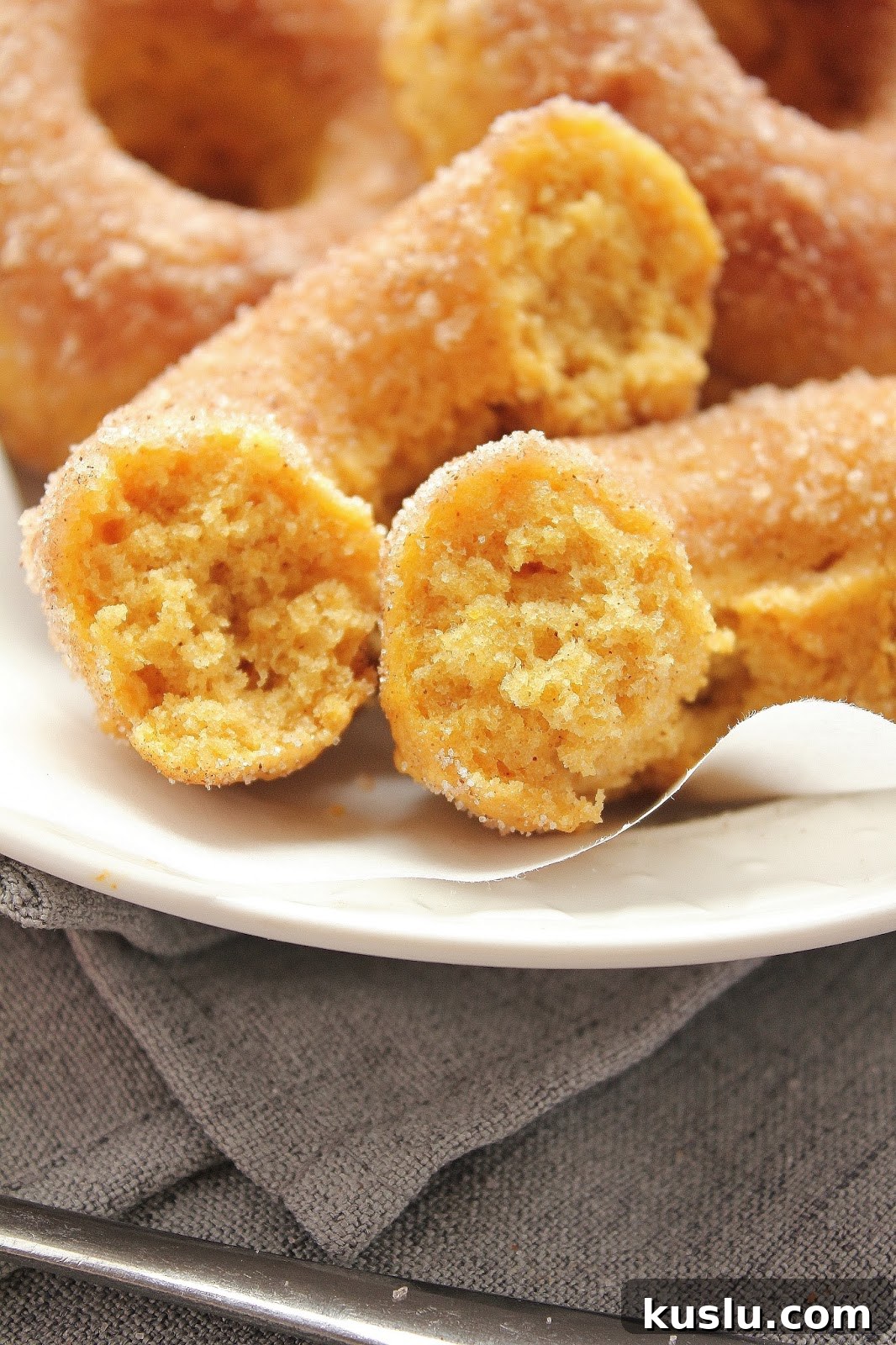 Baked Pumpkin Cinnamon-Sugar Donuts Recipe for Fall Baking 7 Stack of pumpkin donuts