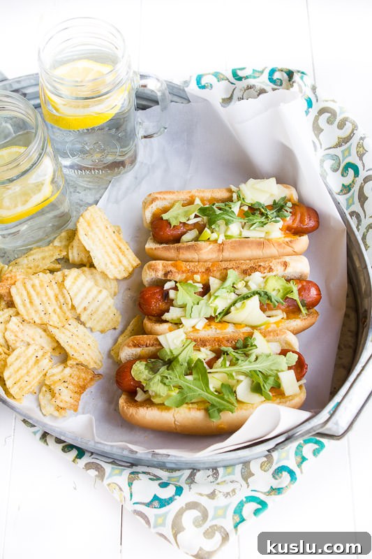 Apple, fennel and cheese hot dogs