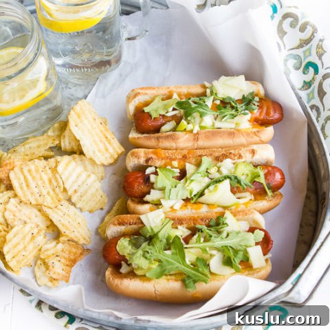 Apple, fennel and cheese hot dogs