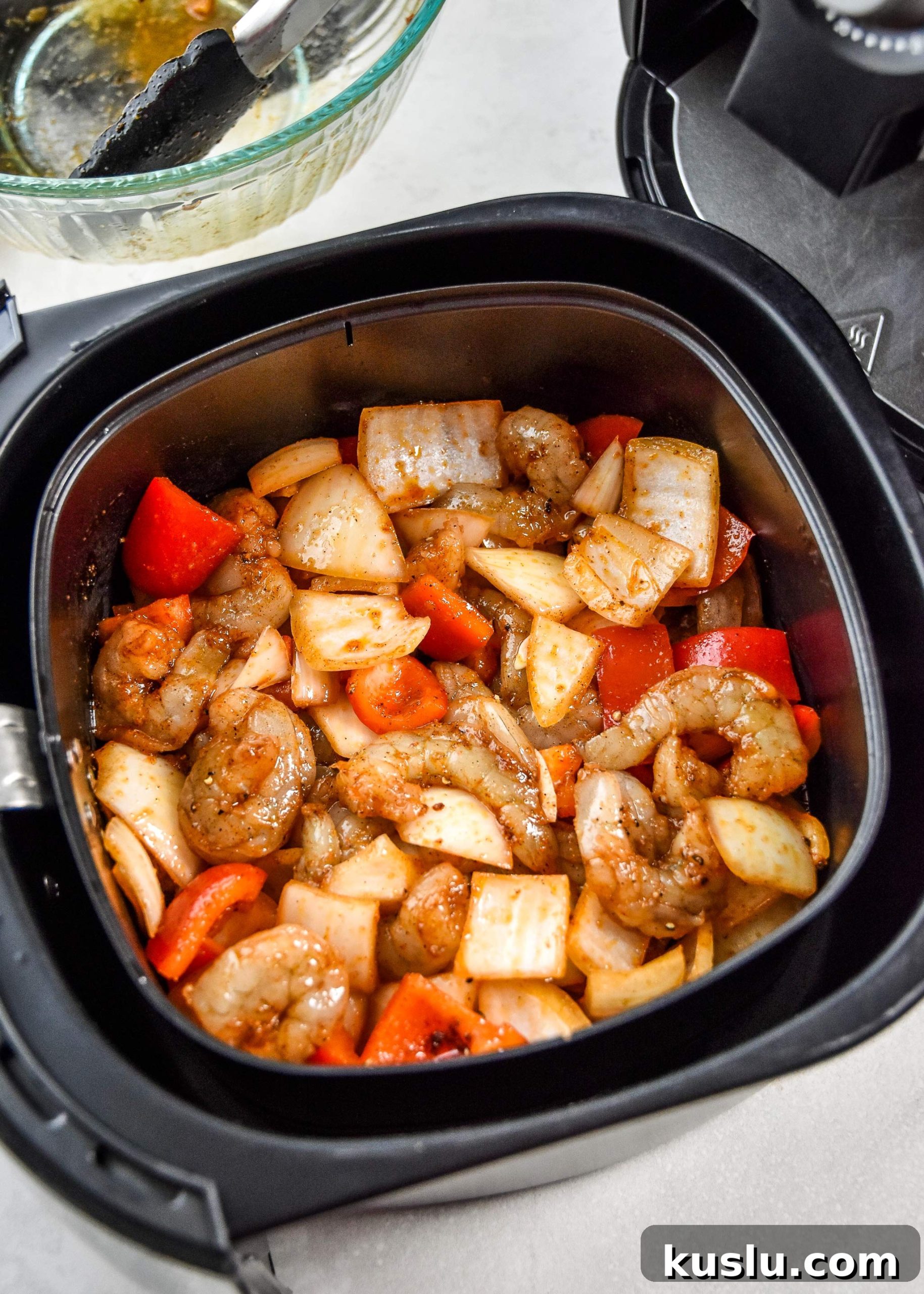 Crispy Air Fryer Shrimp with Roasted Vegetables 5 shrimp and vegetables in an air fryer