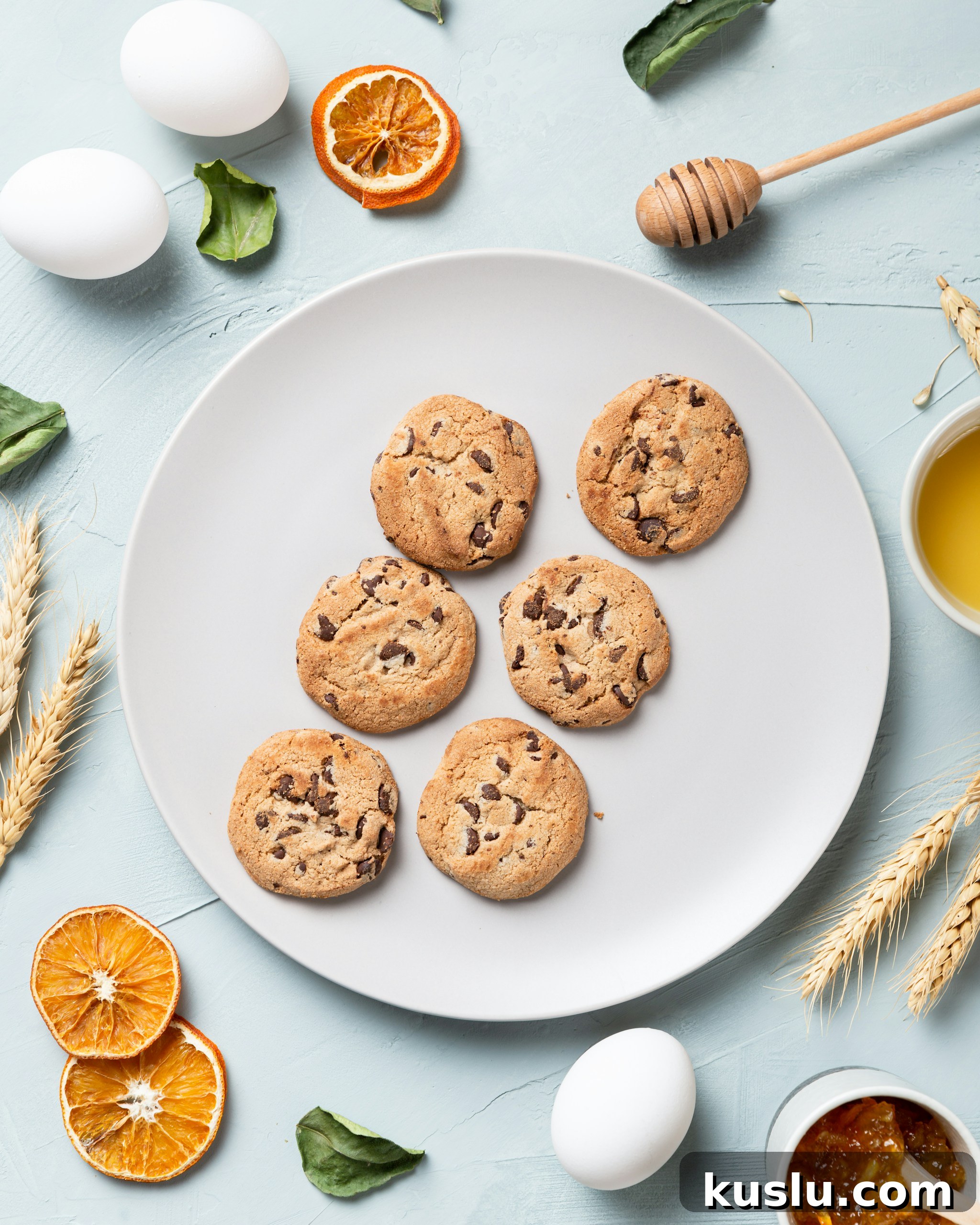 Soft Chewy Almond Flour Oatmeal Cookies — Gluten-Free Recipe 12 A plate of cookies with sliced oranges on the side with two eggs
