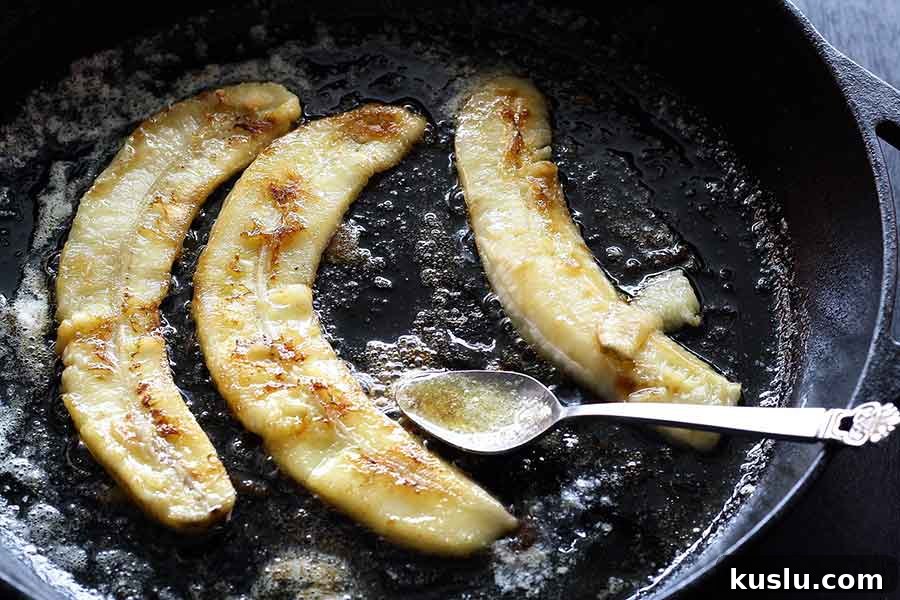 BANANAS COOKING IN CAST IRON SKILLEET
