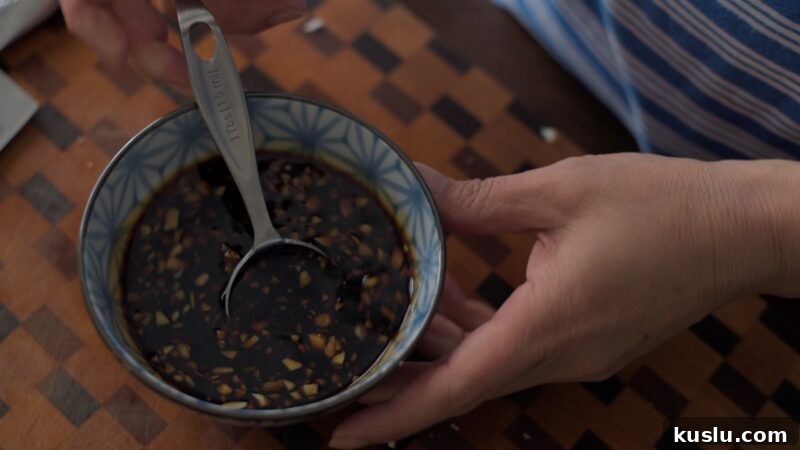 Honey garlic sauce ingredients mixed in a small bowl