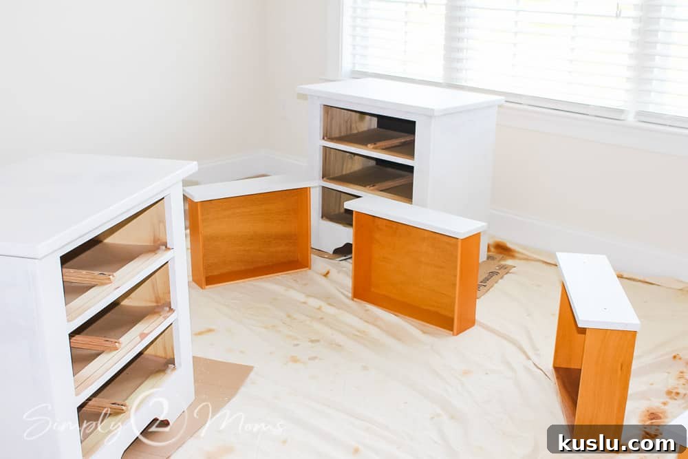 How to Paint Furniture: Step-by-Step Tutorial 8 night stands with drawers removed during painting process with primer on