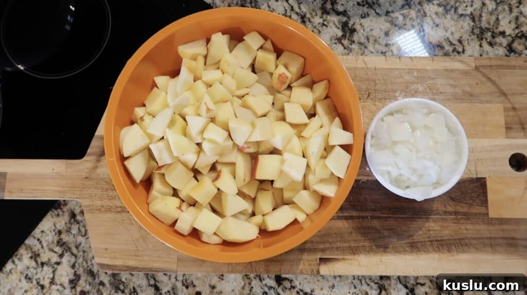 Apples, potatoes and onions peeled and diced