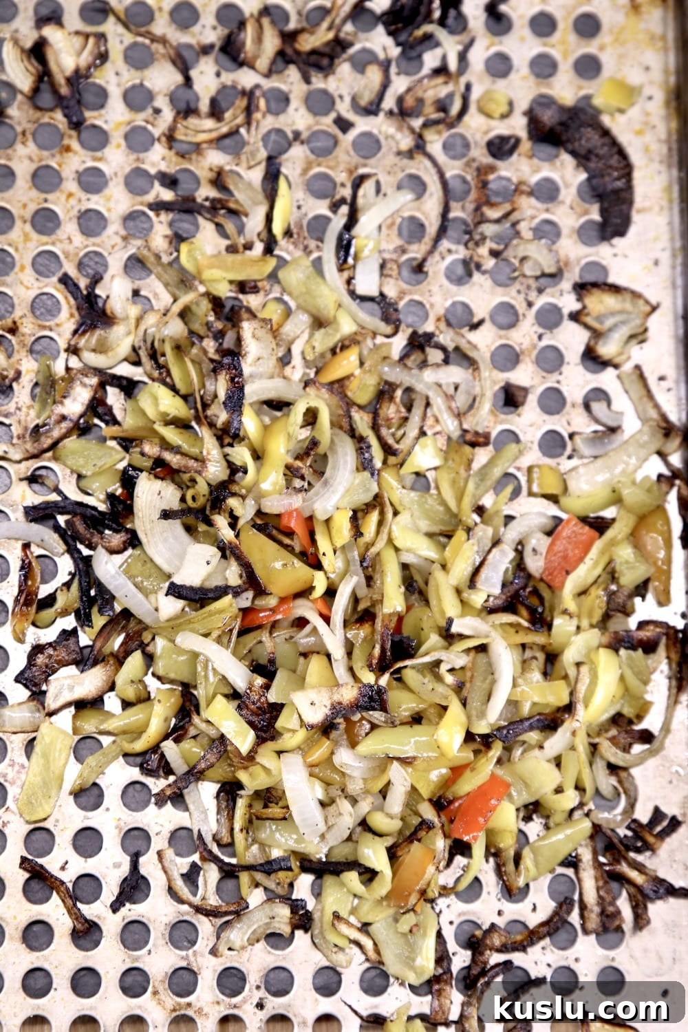 Grilled onions and peppers on a grill pan