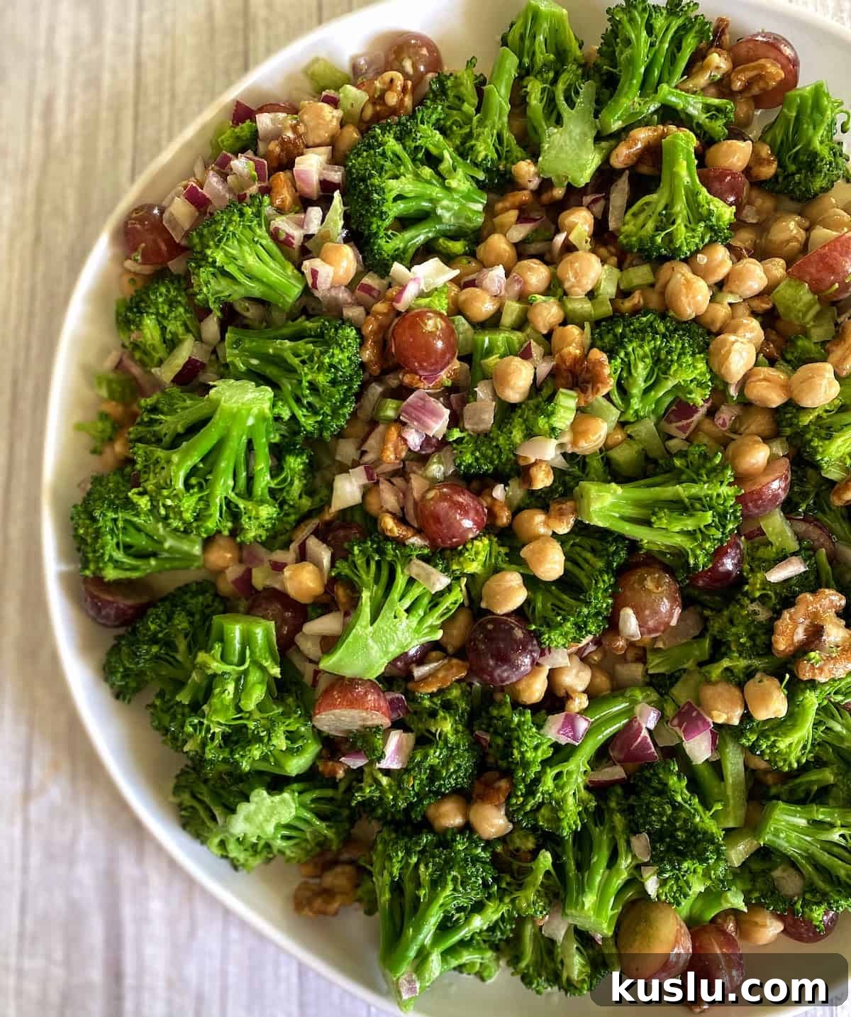 Vegan broccoli salad recipe served on a platter.