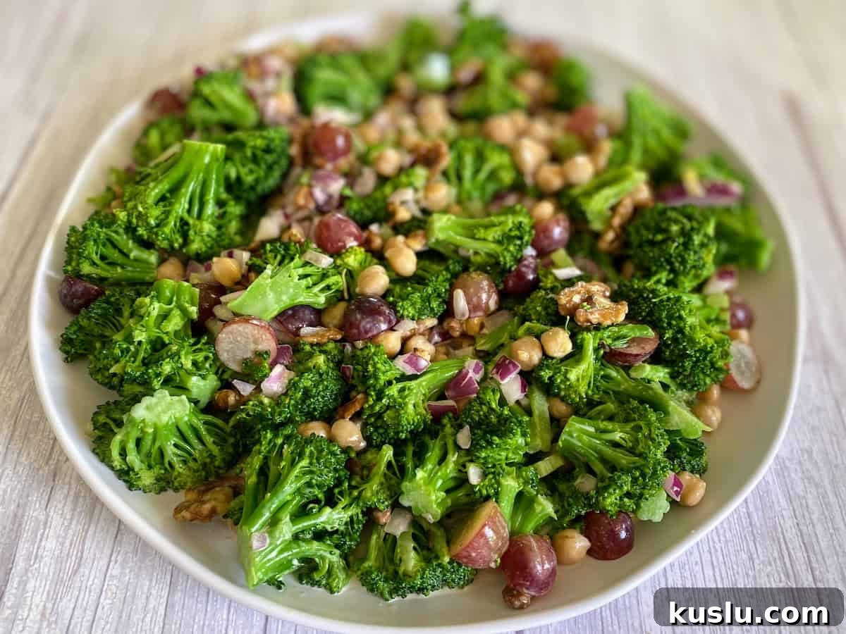 Vegan broccoli salad recipe served in a bowl on the counter.
