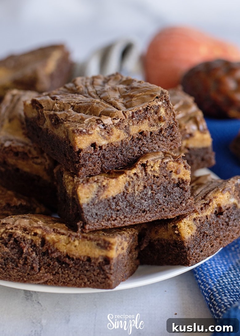 Chocolate Pumpkin Swirl Brownies On Plate