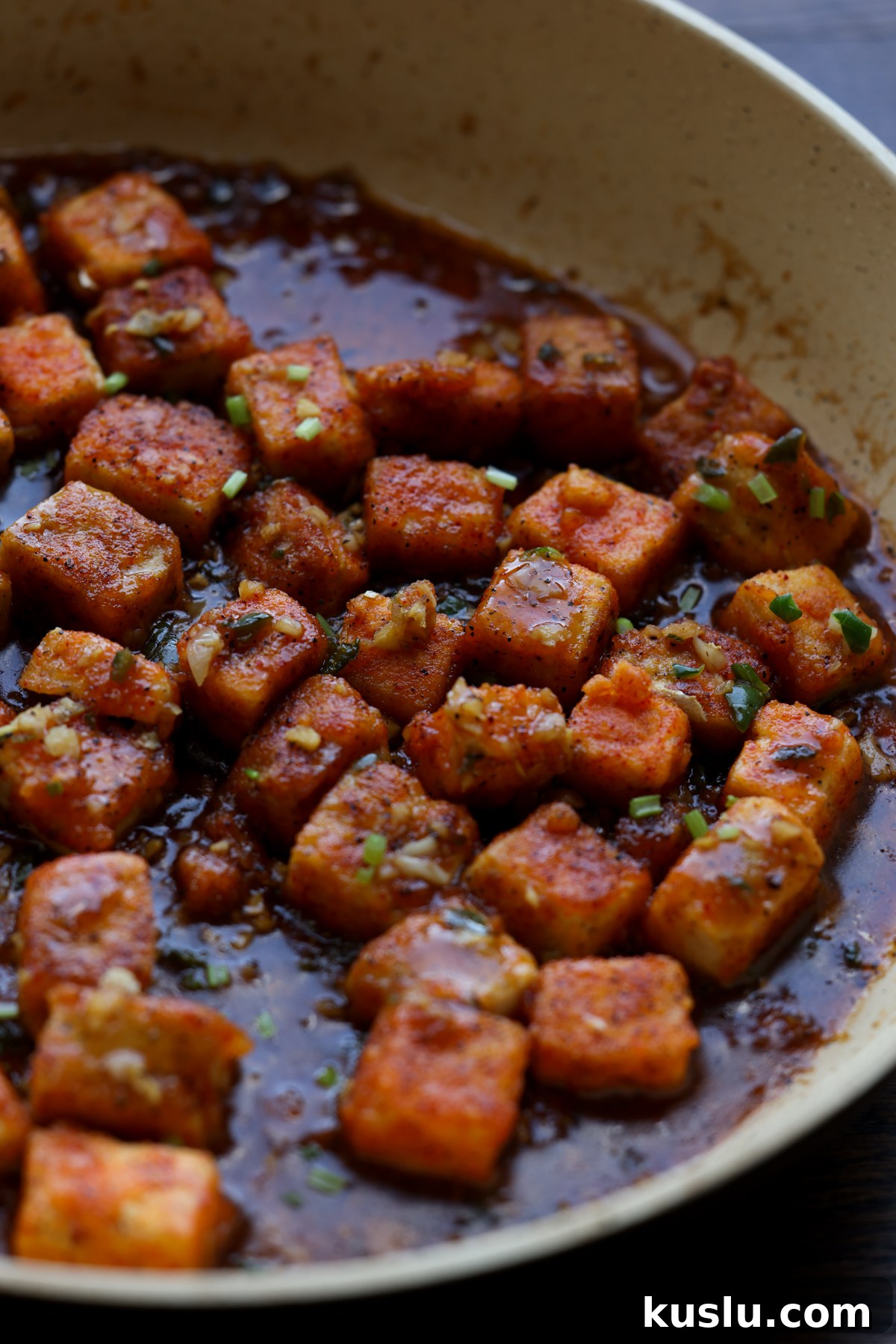 chilli garlic tofu in a pan