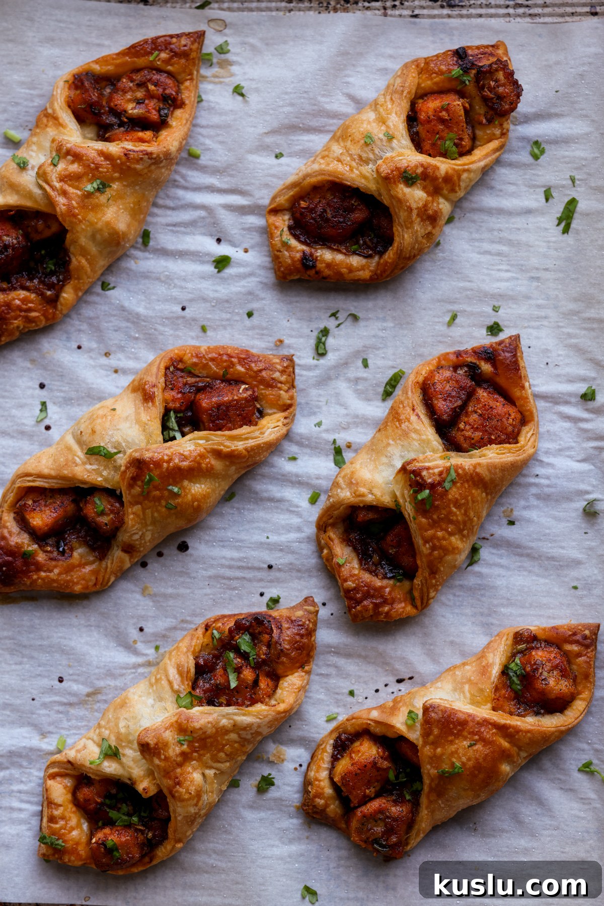 chilli garlic tofu puff pastries on the baking sheet